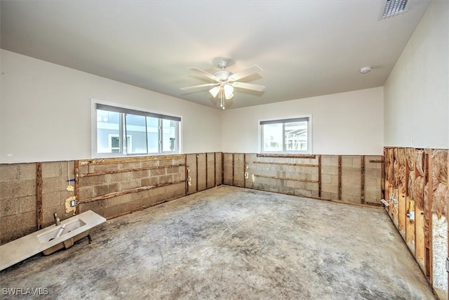 spare room with ceiling fan