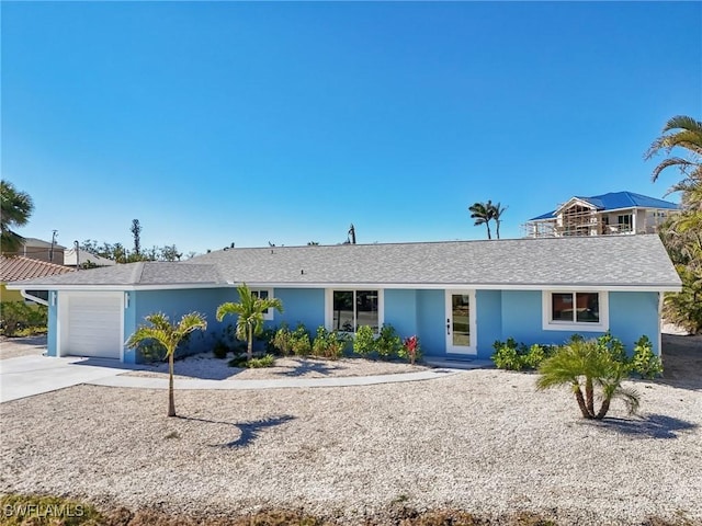 ranch-style home with a garage