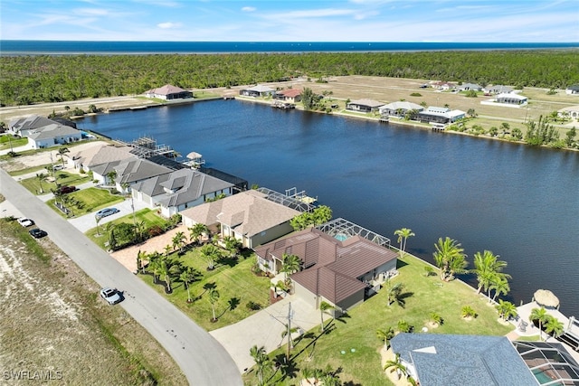 birds eye view of property featuring a water view