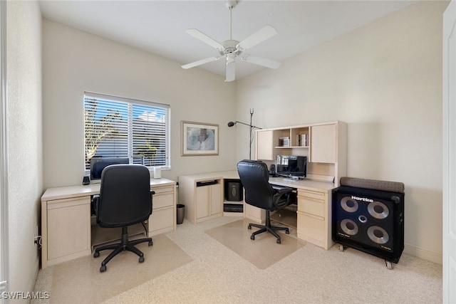 office area with light colored carpet and ceiling fan