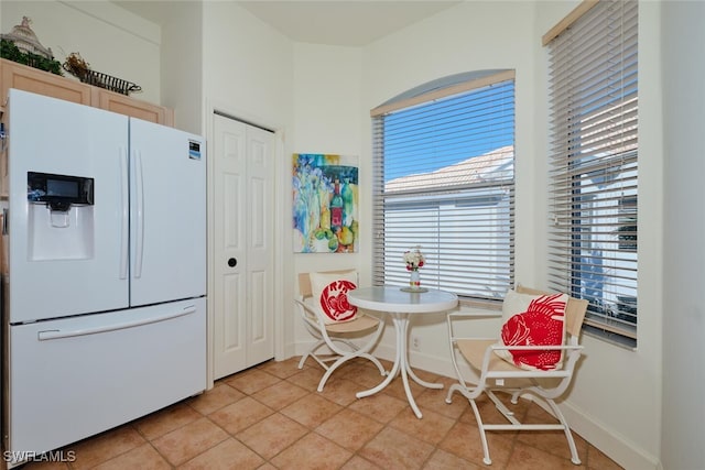 dining room with light tile patterned floors