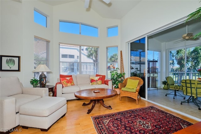 sunroom featuring ceiling fan