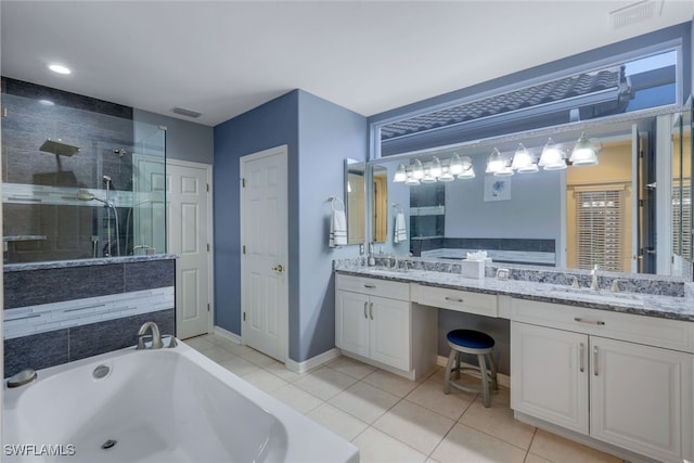 bathroom featuring vanity, tile patterned floors, and independent shower and bath