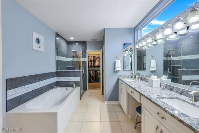 bathroom with vanity, separate shower and tub, and tile patterned floors