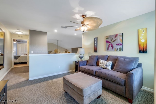 carpeted living room featuring ceiling fan and lofted ceiling