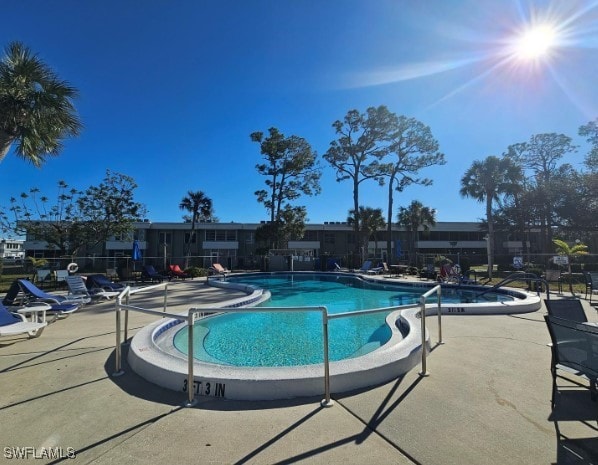 view of swimming pool featuring a patio