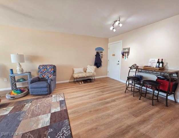 sitting room featuring hardwood / wood-style flooring