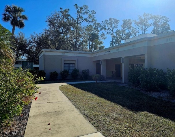 view of front of home with a front yard