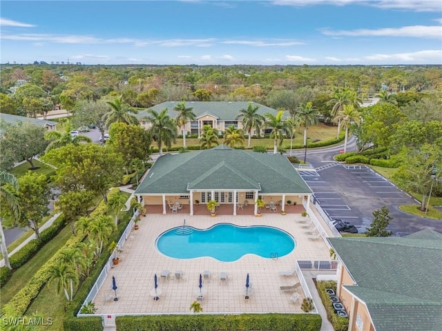 community pool with a patio