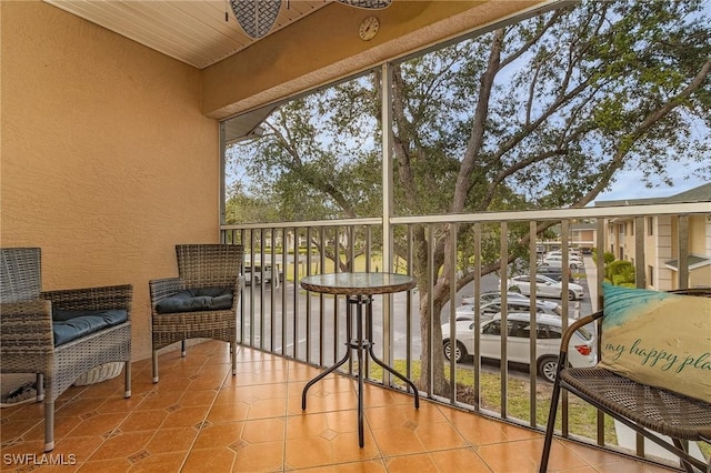 balcony featuring a ceiling fan