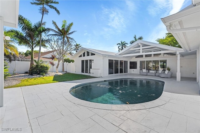 view of swimming pool featuring a patio area