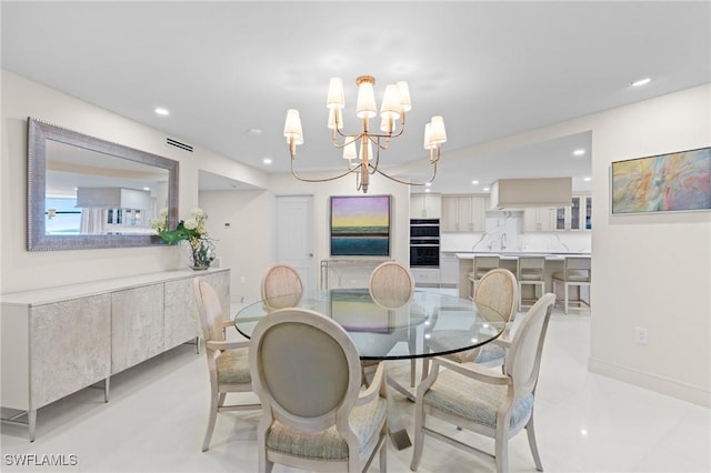 dining room with a chandelier