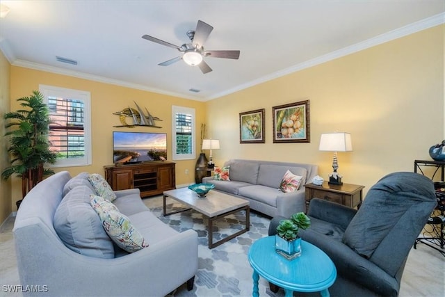 living room featuring ceiling fan and ornamental molding