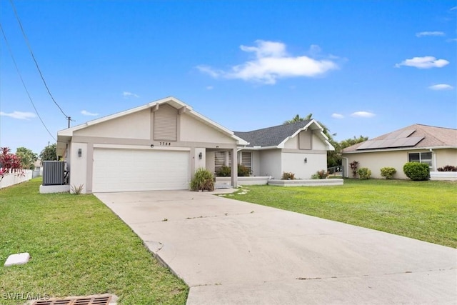 ranch-style home with a garage, a front yard, and central air condition unit