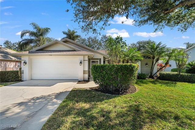 single story home featuring a front yard and a garage