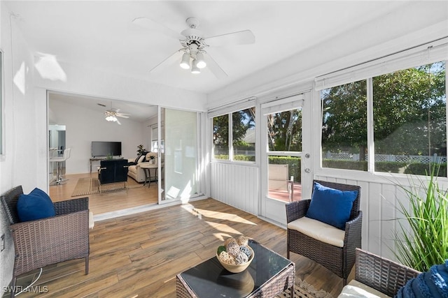 sunroom / solarium with ceiling fan