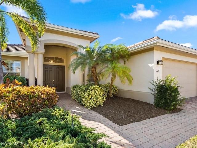 property entrance with a garage