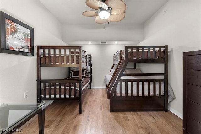 bedroom featuring ceiling fan and hardwood / wood-style floors