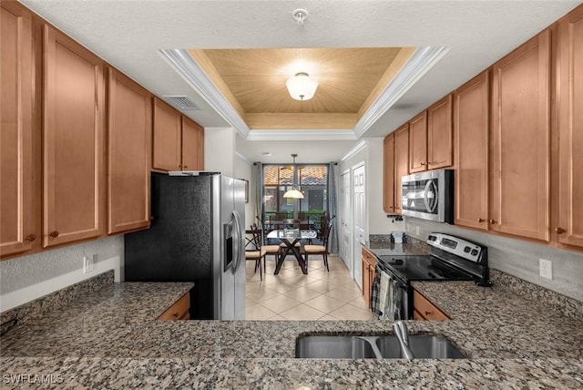 kitchen featuring appliances with stainless steel finishes, sink, light tile patterned floors, a tray ceiling, and crown molding