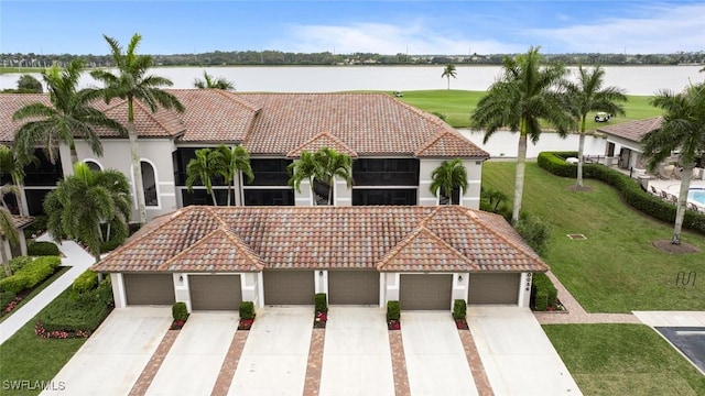 view of front of house featuring a water view