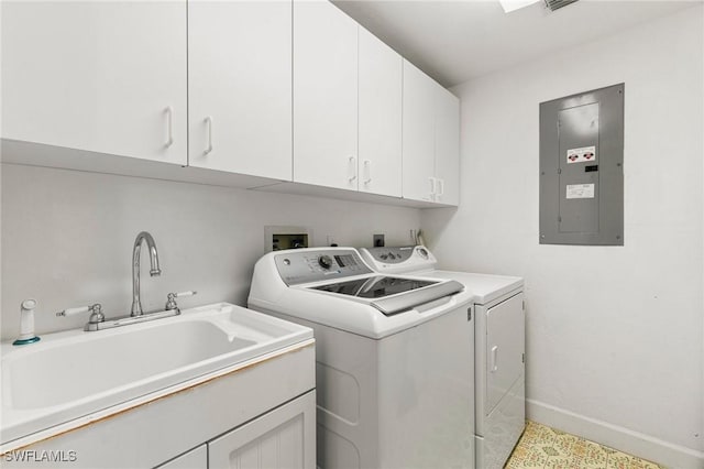 laundry room featuring separate washer and dryer, electric panel, cabinets, and sink