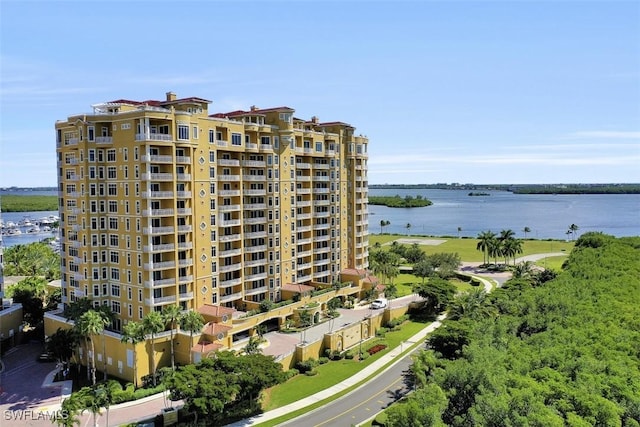 view of building exterior with a water view