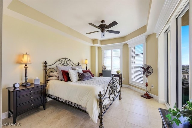 tiled bedroom with ceiling fan