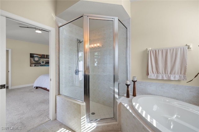 bathroom with tile patterned flooring and independent shower and bath