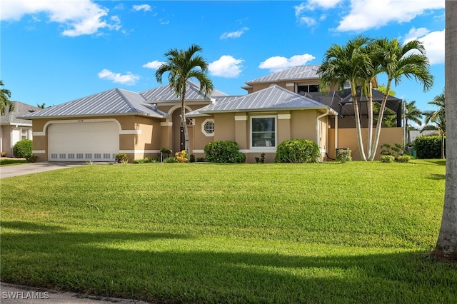 view of front facade with a garage, a lanai, and a front lawn