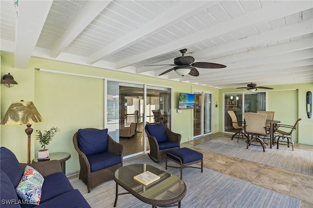 exterior space with ceiling fan and an outdoor hangout area