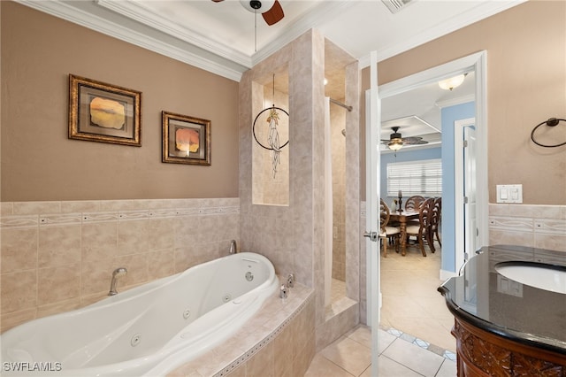 bathroom featuring plus walk in shower, sink, tile patterned flooring, ceiling fan, and crown molding