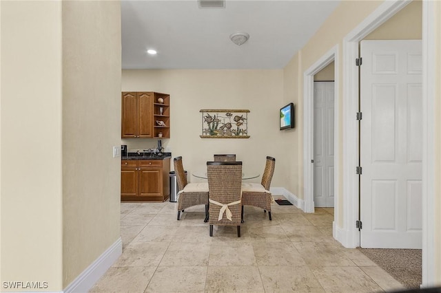 dining room with light tile patterned floors