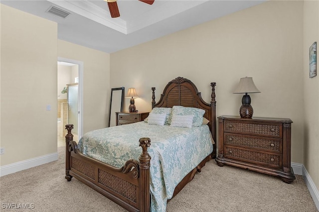 carpeted bedroom featuring connected bathroom and ceiling fan