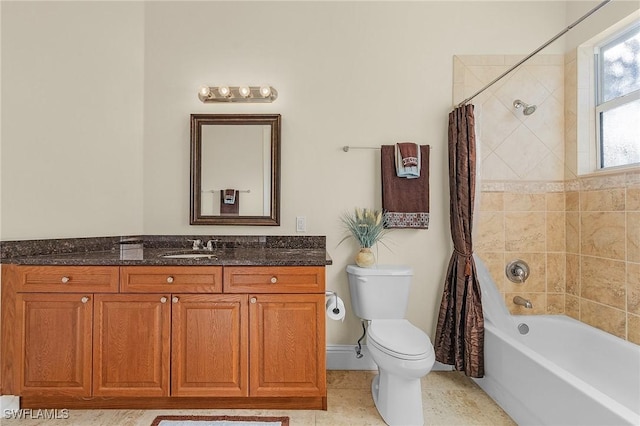 full bathroom featuring tile patterned flooring, shower / bath combo, vanity, and toilet