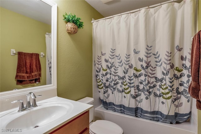 full bathroom featuring vanity, toilet, and shower / bathtub combination with curtain