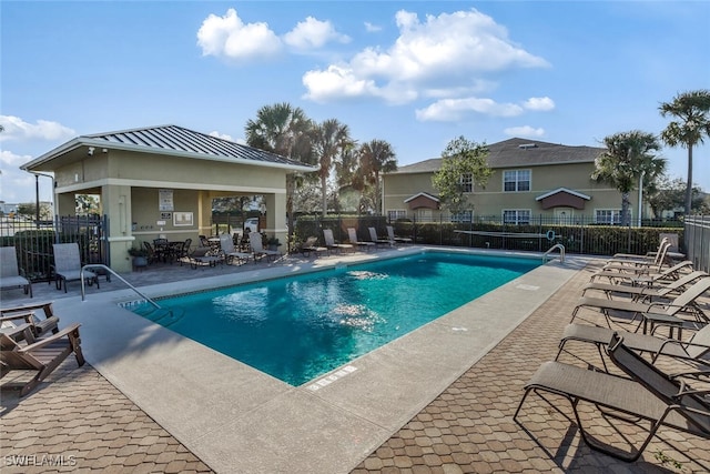 view of pool with a patio area