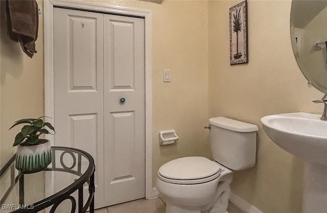 bathroom featuring toilet