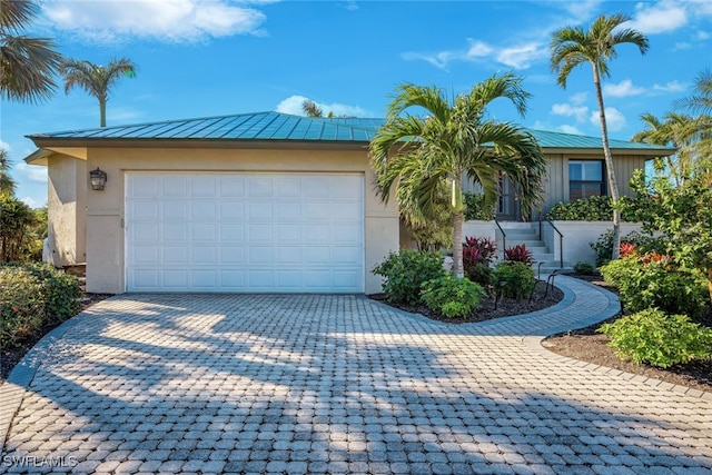 view of front of home featuring a garage