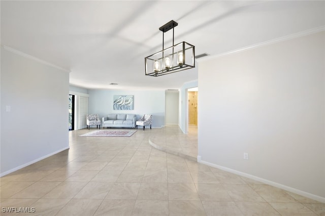 interior space featuring light tile patterned flooring and ornamental molding