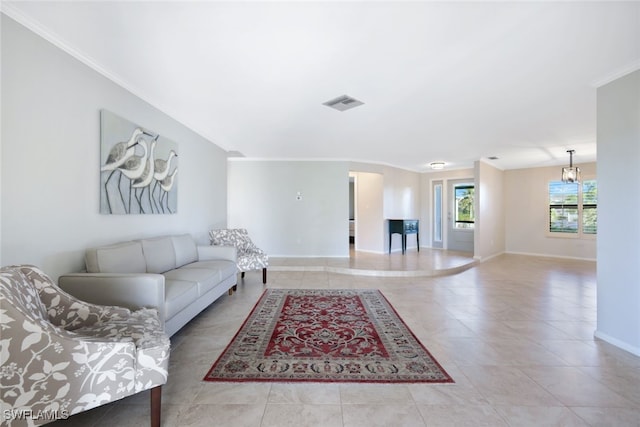 living room featuring a notable chandelier and light tile patterned flooring