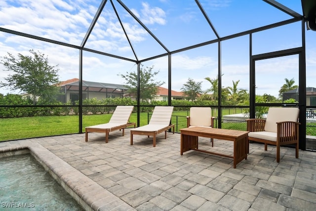 view of patio with a lanai