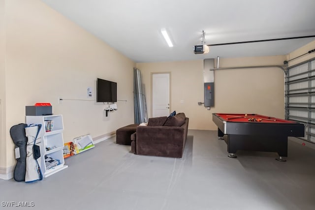 playroom with pool table, concrete flooring, and electric panel