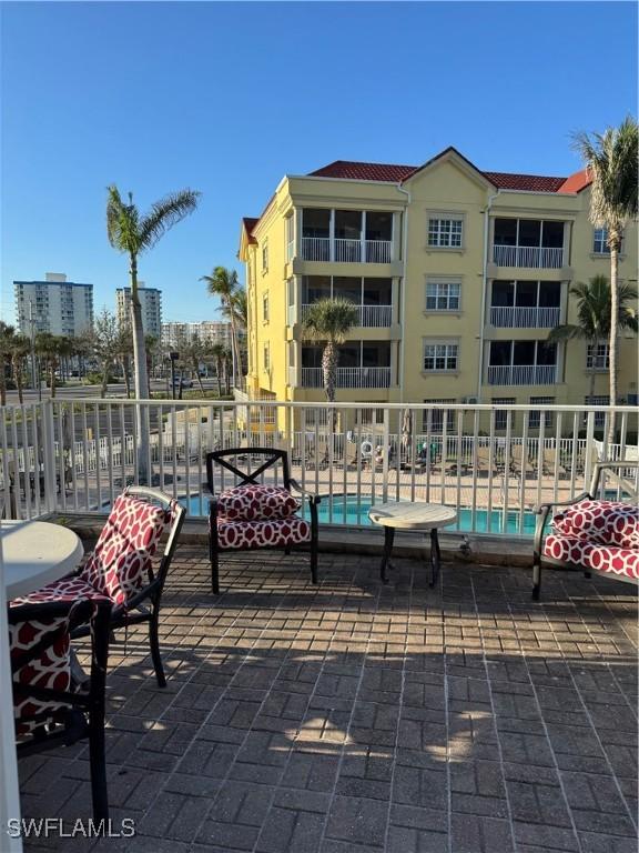 view of patio with a community pool