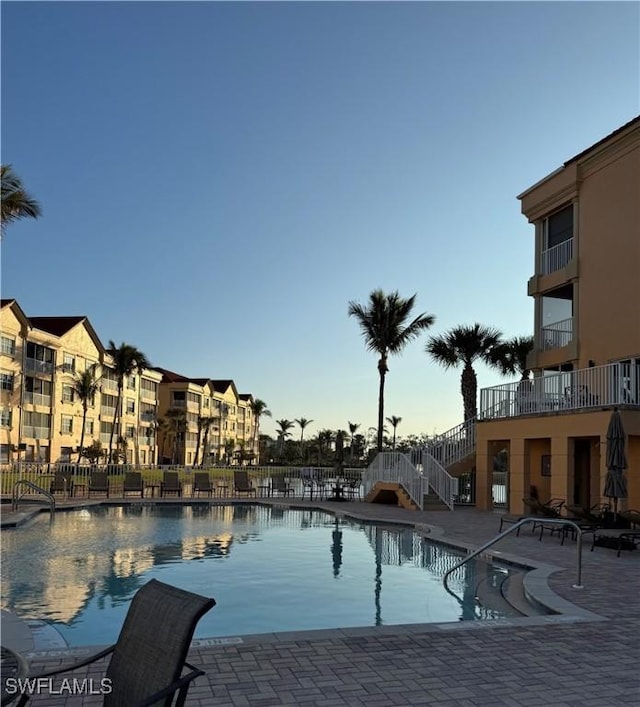 view of pool featuring a patio area