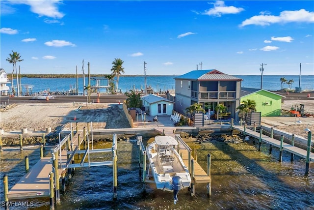 view of dock with a water view