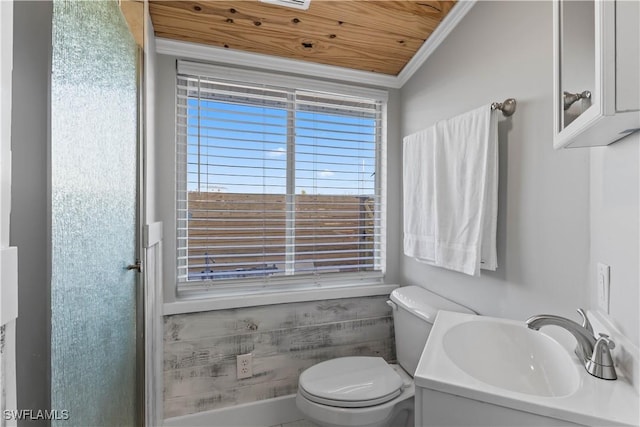 bathroom featuring toilet, vaulted ceiling, ornamental molding, wooden ceiling, and sink