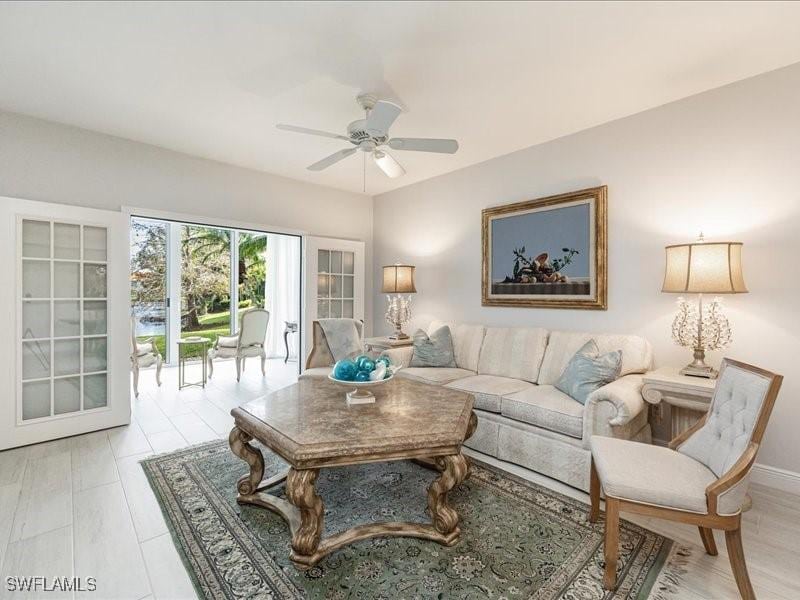 living room with ceiling fan