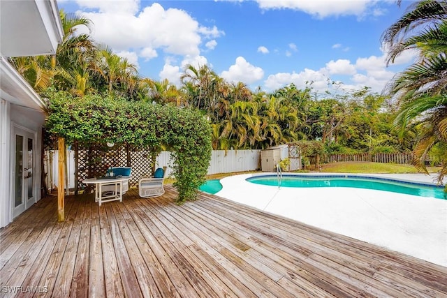 view of pool featuring a wooden deck