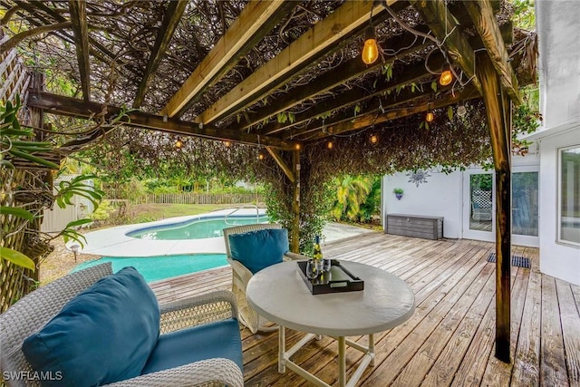 view of pool with an outdoor hangout area and a deck