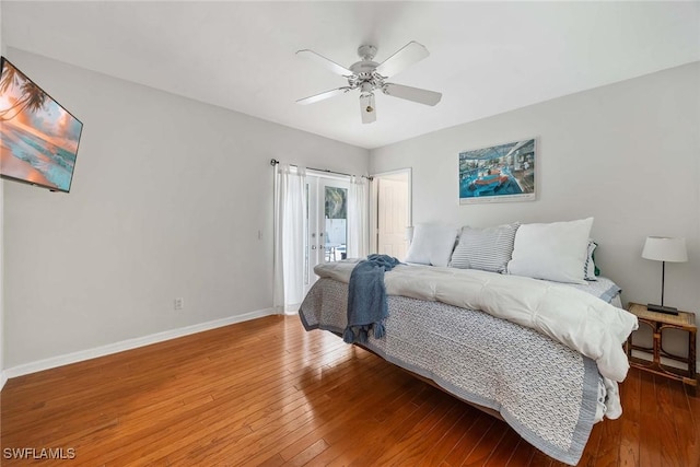 bedroom featuring hardwood / wood-style flooring and ceiling fan